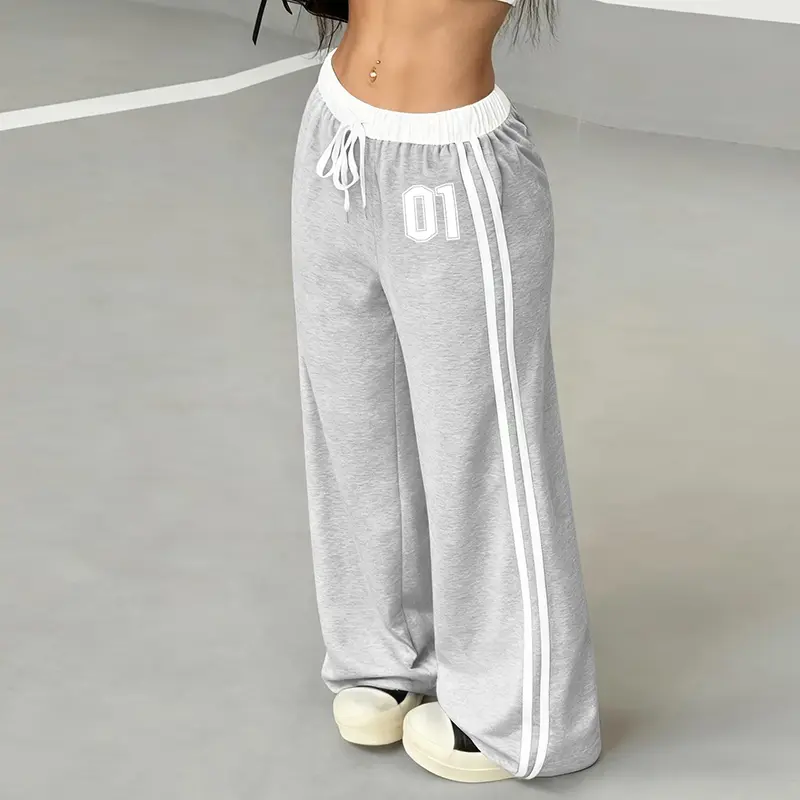All-season loose-fit joggers with a belt and patchwork fabric featuring digital prints, casual street style with a retro vibe.