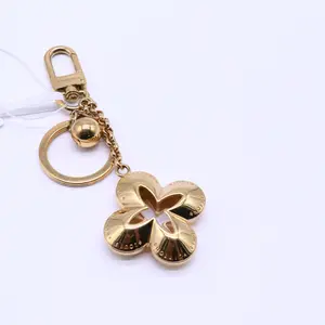 Pre-owned Louis Vuitton Gold Metal Eclipse Key Holder and Bag Charm twins LDJ4313