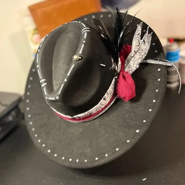 Felt Fedora Hat - Witches Brew - Custom Burning with Custom Band - Skull and Bat pin with Silver Crosses and Feathers in Band. Tint of purple glitter added to bottom brim of hat.  Extensive Design.