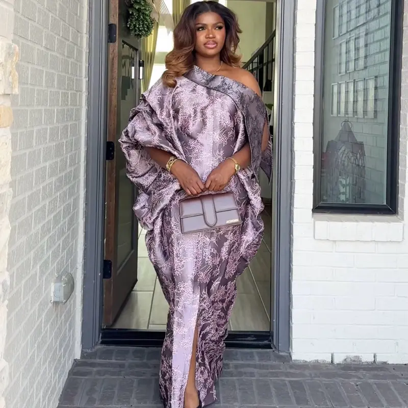 Anika Regal Dress - Elegant Off-Shoulder Design with Flowing Fabric and Chic Look