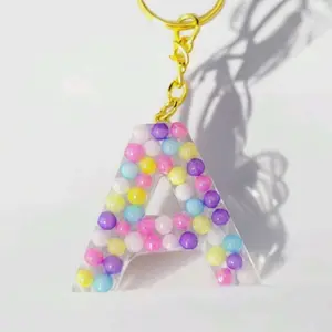 Multi color beaded letter keychain