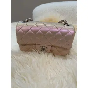 Pre-owned CHANEL Calfskin Crossbody Bags CLASSIC MINI RECTANGULAR SINGLE FLAP IRIDESCENT PINK LEATHER WITH SILVER HARDWARE