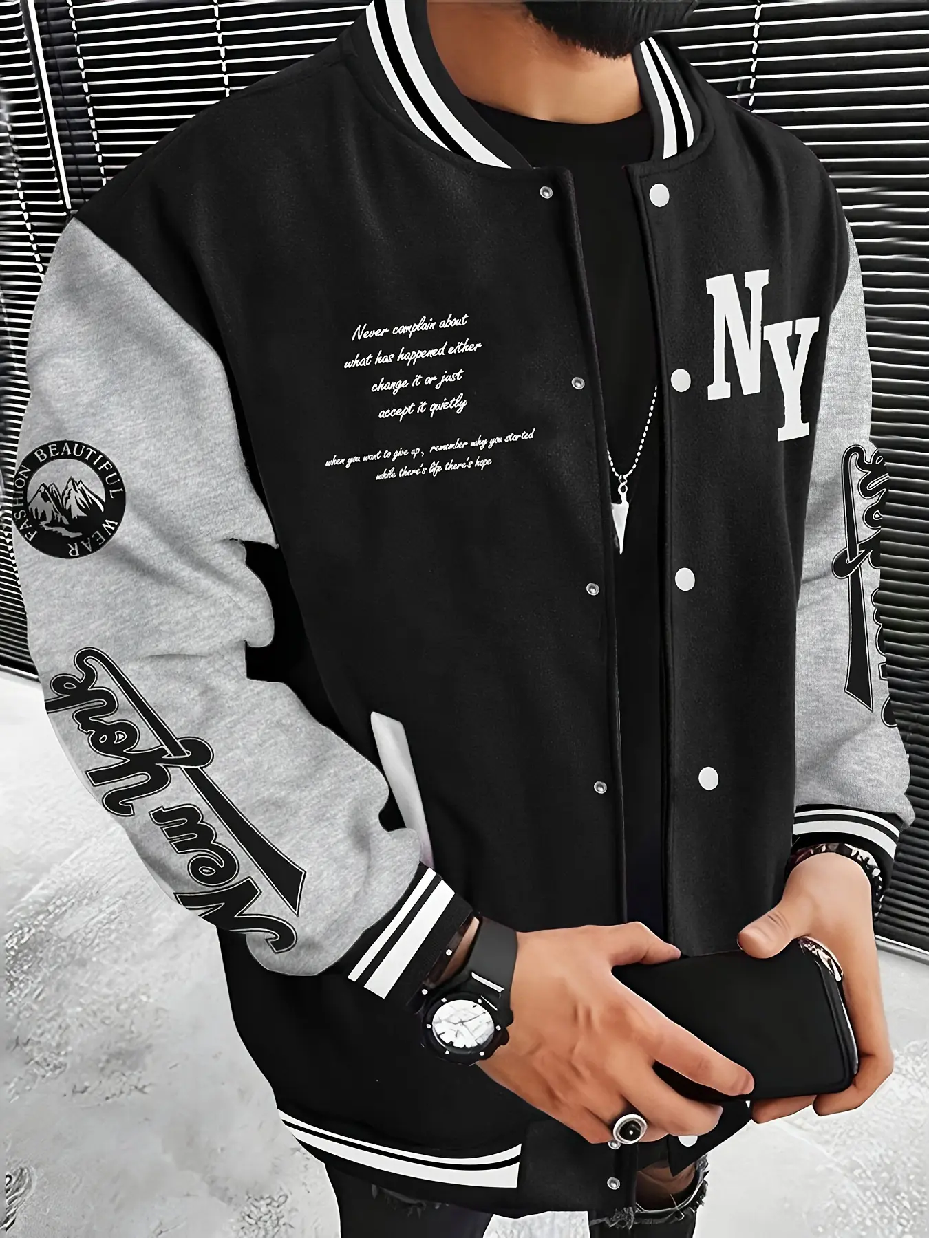 Men’s retro street-style baseball jacket with color blocking, raglan sleeves, a baseball collar, and button closure; featuring multi-location English lettering prints and ribbed contrast piping; a men’s casual outerwear piece for everyday wear.