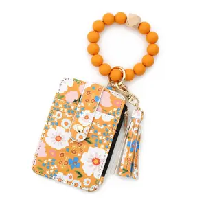 Boho Style Daisy Flower Pattern Phone Wallet with Zipper Design Fashionable Silicone Beaded Wristlet Tassel Decor Compact Size for Everyday Use