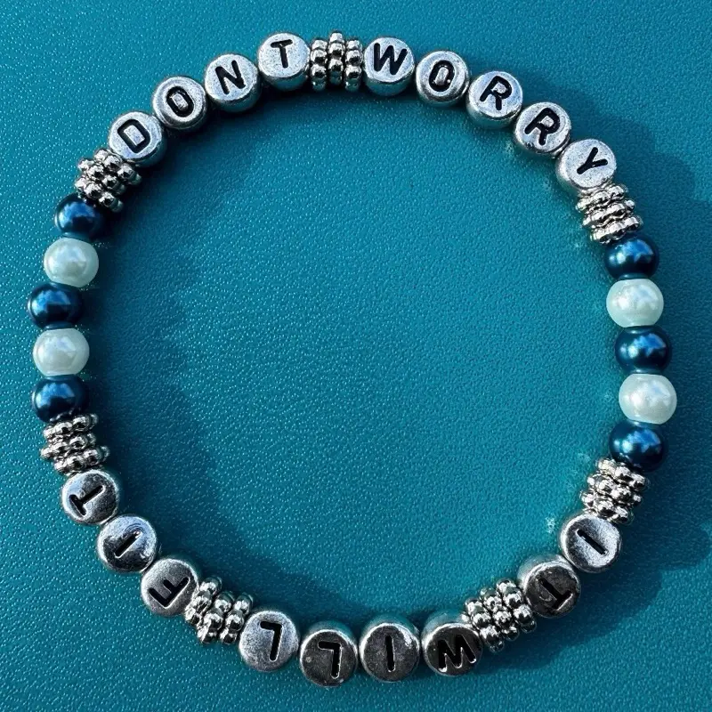 Don’t worry; it will fit. Beaded friendship bracelet.