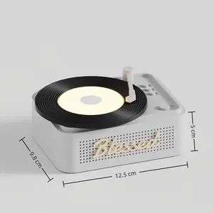 Wireless Speaker Designed Like a Retro Vinyl Record, Featuring a Rotating Turntable with Intricate Laser-Cut Patterns And Golden Lettering, Perfect for Home Decoration And Enjoying Music on The Go