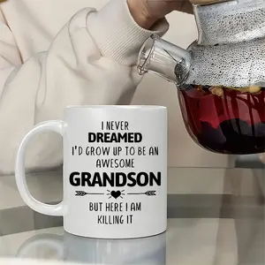 1pc Funny "Awesome Grandson" 11oz Ceramic Mug – Humorous Coffee Cup for Grandson, Perfect Birthday Gift from Grandparents, Reusable & Dishwasher Safe, White with Black Handles and Rim