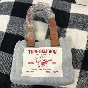 True religion blue and tan tote bag