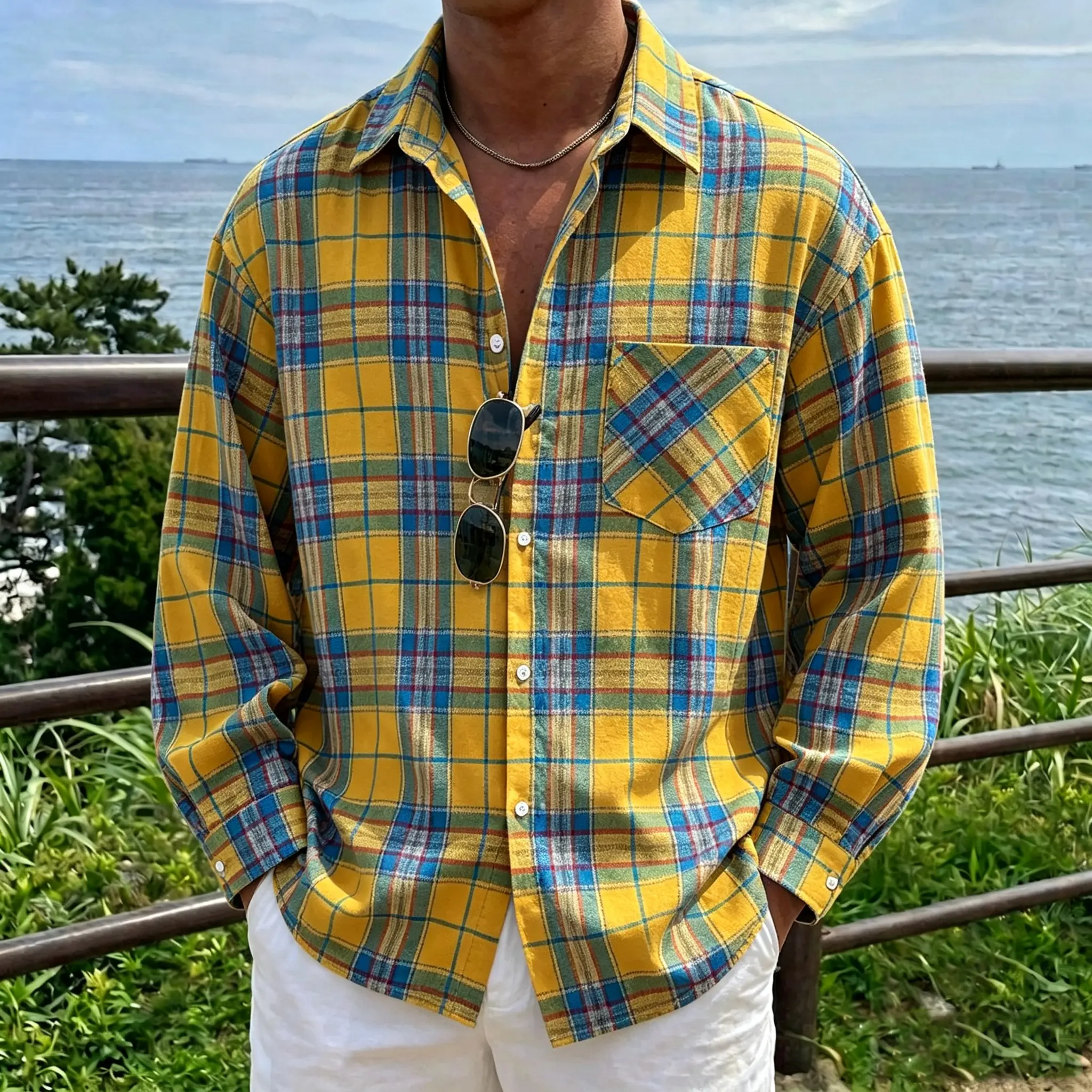 Men’s oversized mustard yellow plaid shirt, long-sleeve button-down collar shirt with a single chest pocket on one side, lightweight plaid casual short top suitable for beachwear, streetwear, everyday wear in spring and autumn.