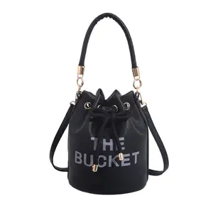 Women's large-capacity crossbody/tote bucket bag, solid color with letter print, pleated drawstring crossbody bag.