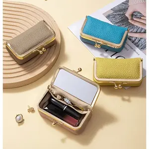 New top-layer cowhide leather makeup mirror with multi-functional lipstick storage bag, portable and compact jewelry storage box, used for storing lipstick, coins, jewelry, rings, necklaces, and earphones. A gift for a girlfriend