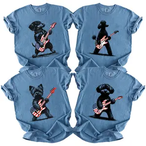 Puppy Love Dog Rock Funny Dog Playing Guitar Rock Style T-shirt Showcasing 50 dog breeds in 4th of July Graphic Blue Jean Comfort Color, Cute Puppy Independence Day Shirt for Dog Lovers, printed on a cozy Gildan unisex crew pullover for pet lovers.