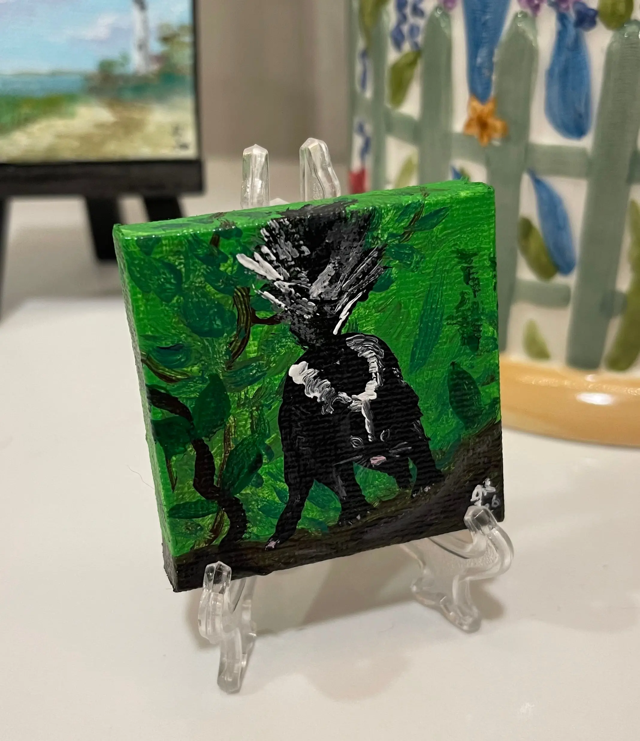 Sticky Skunk Magnet Painting