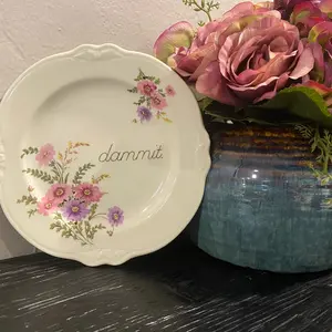“Dammit” plate