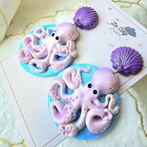 La Clay Dreams Handmade Polymer Clay Earrings Octopus Design with Purple Seashell Hypoallergenic backings.