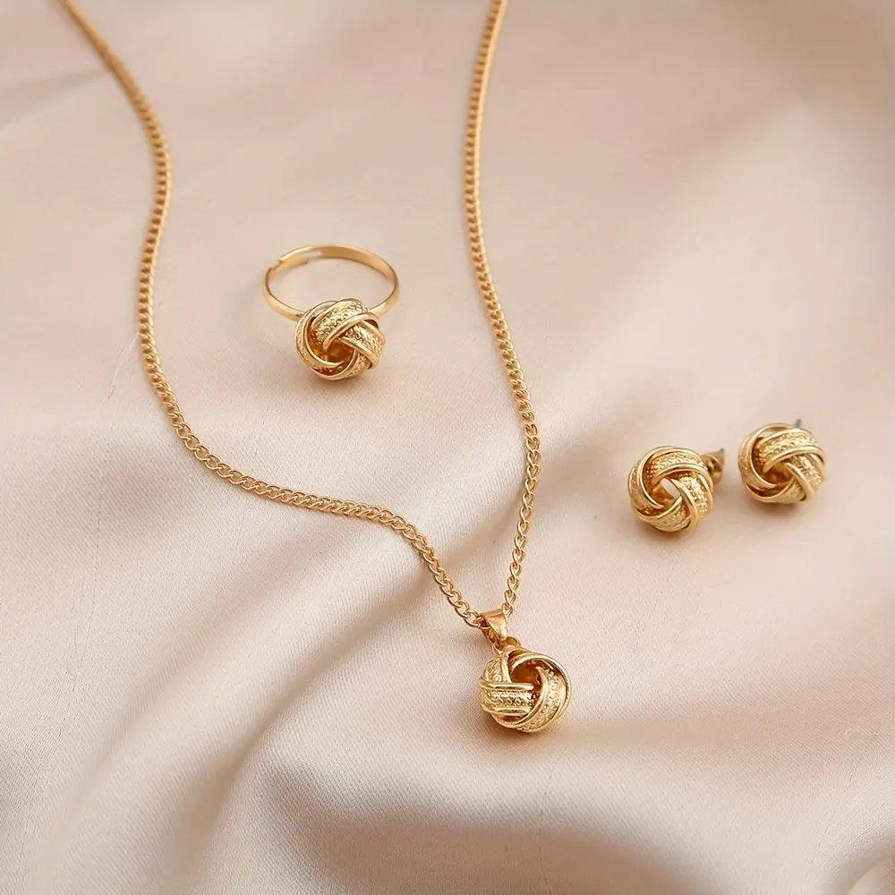 A Set of Hollow Knot-Shaped 3D Round Rings, Earrings, And Necklace Jewelry for Women, Perfect As a Gift for a Date.