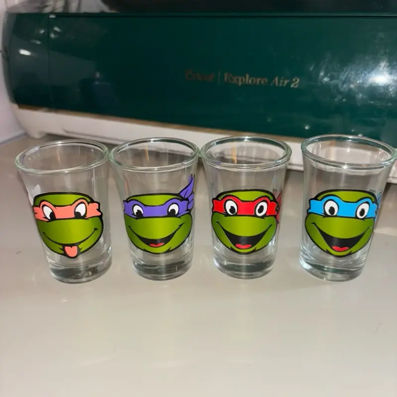 Set of 4 Turtle Shot Glasses with Colorful Mask Designs Perfect for Your Collection