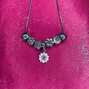 Delilah charm necklace meaning delicate.