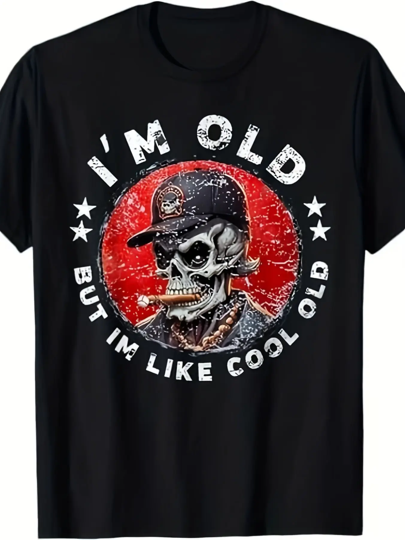 Men'S Black T-Shirt, Featuring a Bold Graphic Design with a Red Circular Background, Edgy Stylized Skull Wearing a Dark Cap And Golden Chain, Humorous Text 'I'M OLD BUT I'M LIKE COOL OLD' in White, Adorned with Small Star Symbols,