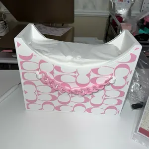 Purse Basket with Pink Chain Handle and White Background, Not Filled, Ideal for Organization and Storage