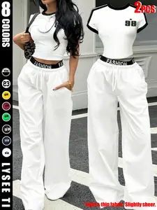 European and American spicy girl style black and white contrasting striped short top+letter waist wide leg pants women's two-piece set