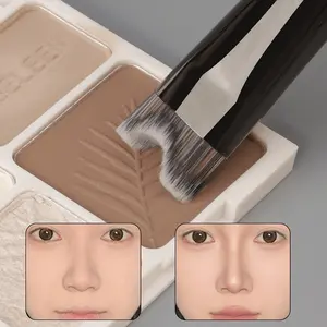 U-shaped nose contouring brush - Double-ended nose contouring and highlighting brush, U-shaped handle design, ergonomic grip with soft bristles for precise contouring