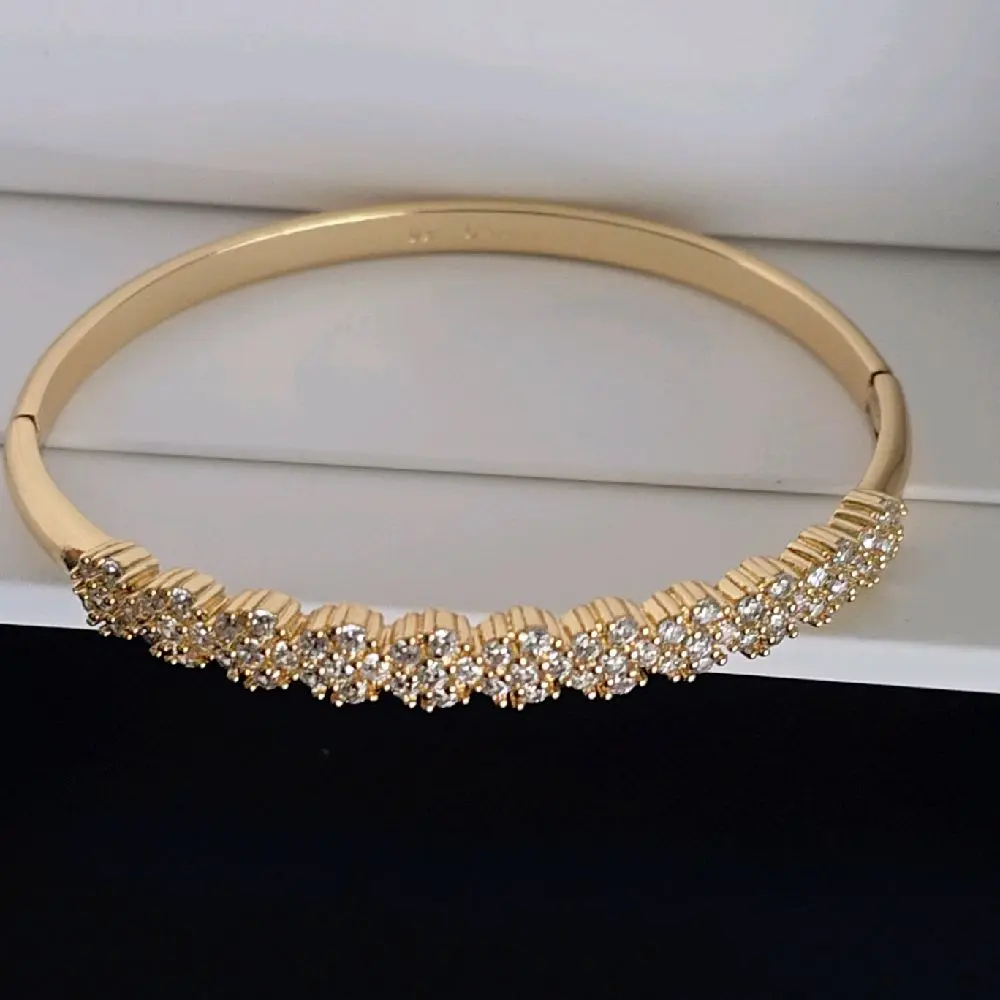 Gold Bangle with Rhinestones - Elegant and Versatile Jewelry Piece for Everyday Wear