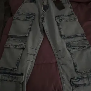 STYLO Men's Baggy Cargo Pocket Denim Jeans , Loose Fit Wide Leg  Casual Bottoms All Seasons - Fabric