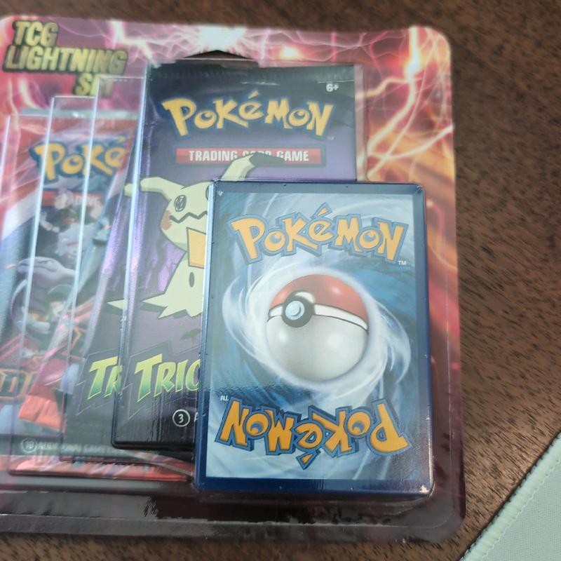 Pokemon TCG Lightning Set - Includes Trading Card Game Cards & Collectible Poké Ball - Official Pokemon Brand