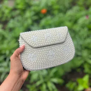 White pearl clutch