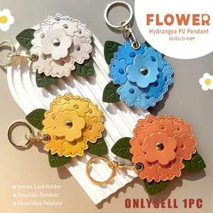 High-End Clivia Flower Airtag Protective Case, Anti-Drop GPS Leather Keychain, ID Badge Holder, Bag Strap, Luggage Pendant