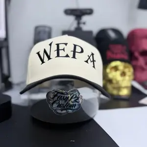 WEPA Cream & Black Classic Curve Hat with Bold Lettering and Stylish Design for Everyday Wear