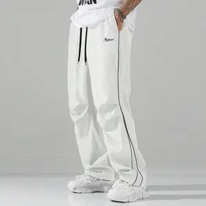 Lightweight Athletic Pants Contrast Side Stripes With Script Branding Relaxed Fit Bottoms, Versatile For Coffee Runs And Low-Key Urban Ensembles With A Smooth, Flowy Drape That Keeps You Comfortable All Day