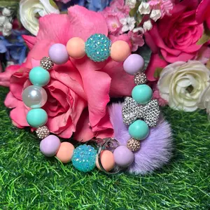 Spring zing Wristlet Keychain color scheme mint green, peach, lavender, mint green and bling beads made with wire