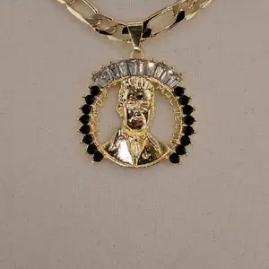 (37)  #2. Malverde. Pendant and Chain 24" 14KGold Laminated with Elegant Design