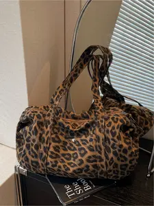 Large capacity denim leopard print luggage bag, made of tough fabric suitable for urban life, with non glaring prints, niche design, versatile tote bag, convenient sports bag, Denim shoulder satchel
