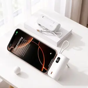Mini Capsule Mobile Power Bank with Attached Cable, Airline Approved, 5000mAh Portable Charger, Digital Display and Dual Charging Ports, Compatible with iPhone and Android Phones