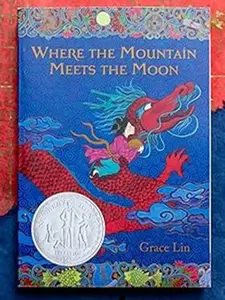 Where the Mountain Meets the Moon Newbery Honor Book by Grace Lin Paperback Edition with Vibrant Dragon Illustration