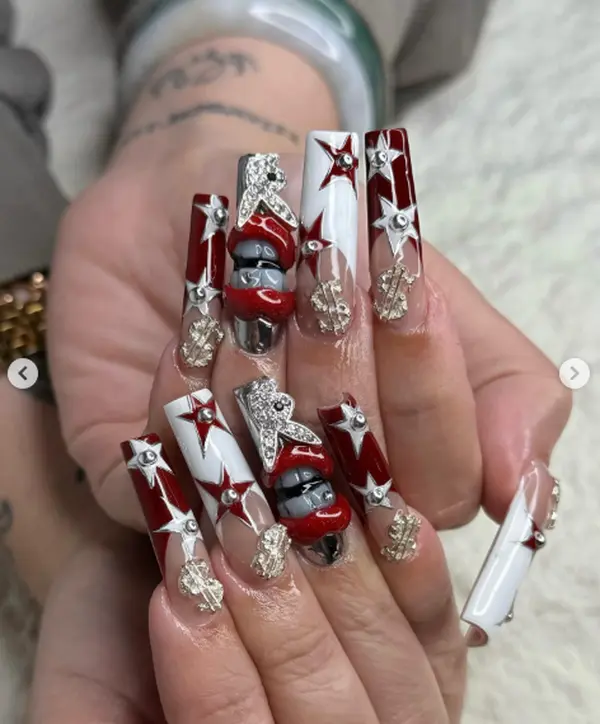 Baddie aesthetic nail art, long coffin nails with 3D star & money charms, red & white chrome design. Perfect for festivals