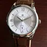 1PC Men's Watch, Analog Quartz Movement, Simple Textured Silver Dial, Calendar Function, Coffee-Colored Leather Strap, SUS304 Stainless Steel Case, Gift for Family and Friends, Quartz Wristwatches