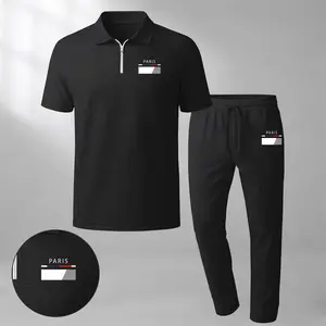Men's Paris Print Zip-Up Collar Short-Sleeve Polo Shirt And Pants Two-Piece Set, Made With Waffle Knit Fabric, Breathable And Comfortable, Soft Texture, And A Relaxed Fit, Suitable For Everyday Casual Wear.