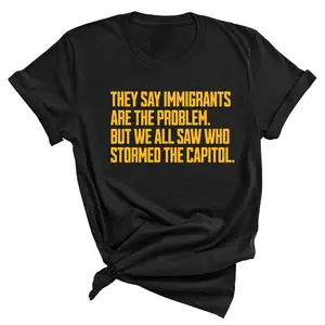They say immigrants are the problem. But we all saw who stormed the Capitol Unisex Tee LIMITED EDITION (Gold)