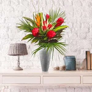 Nice Tropical Bqt - Colorful Floral Arrangement with 4 Gingers 2 Golden Heliconias 3 Loafas 3 Chili Open 3 Areca Palms 2 Masajeana Leaves 2 Pandanus Leaves 6 Cordelines Tips 4 Curly Willows 1 Croton Tip 1 Lettuce Fern