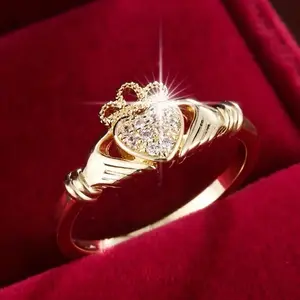 Golden Claddagh and Zircon Ring sizes  6, 7, 8, 9, 10 available