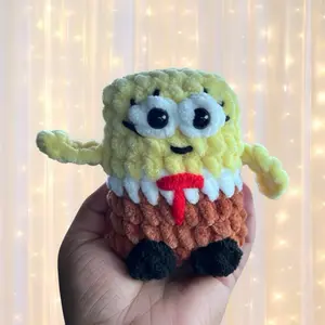 Crocheted yellow sponge friend