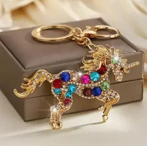 Luxurious Alloy Rhinestone Keychain with Multicolored Glass Gem Embellished Mythical Horse Design Lobster Clasp Golden-Tone Accents Sparkling Fashion Accessory for Women Ideal Gift for Birthdays Anniversaries Horse Lover Gifts