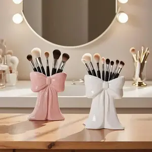 Bow-shaped tabletop vase decoration, bow ornament for living room TV cabinet, cosmetics storage box, beauty supplies storage box, makeup brush and office supplies storage box, makeup brush holder, an ideal gift for girls and women sports event souvenir ti