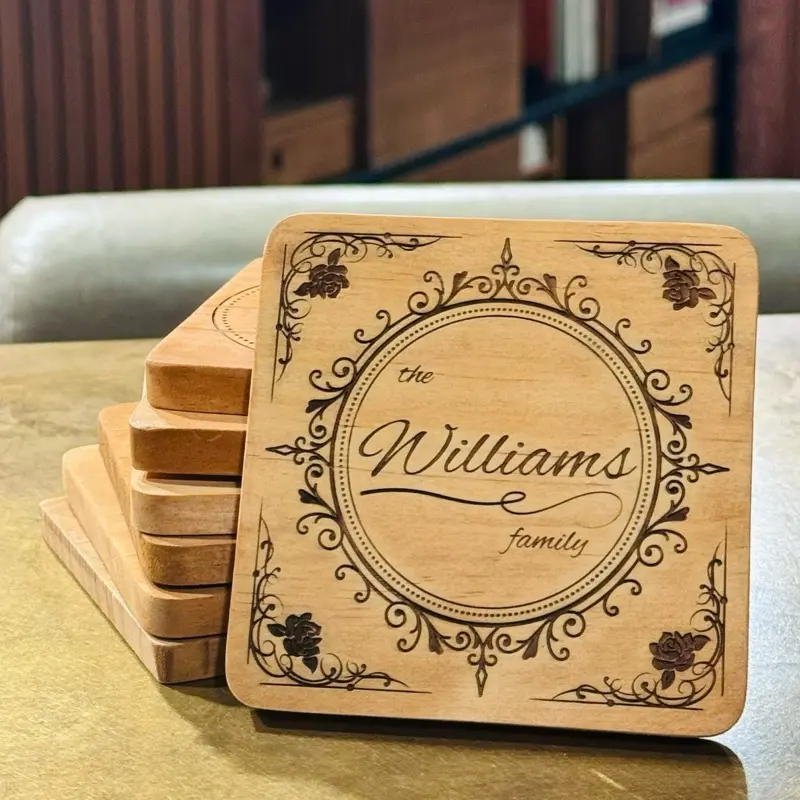 Elegant Personalized Family Coasters - The Perfect Housewarming Gift with Engraved Name and Floral & Scrollwork Design - Tableware