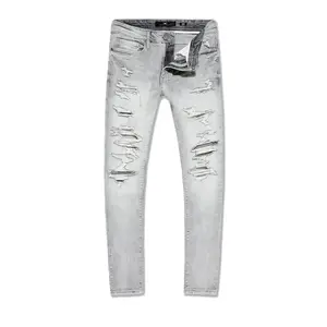 Men's Jeans in a Slim Taper Fit, Ripped and Distressed Stretch Cotton Denim for a Vintage Streetwear Aesthetic