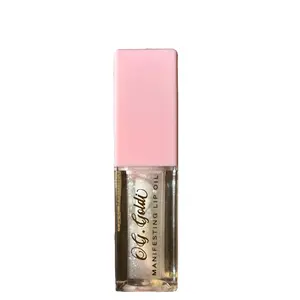 Crystal kiss manifesting lip gloss oil. Experience the magic : Charged glosses for your soul. You're not just wearing lip gloss, you're harnessing the energy of the cosmos. Feel the enchantment every time you apply it. Manifest all you desire!